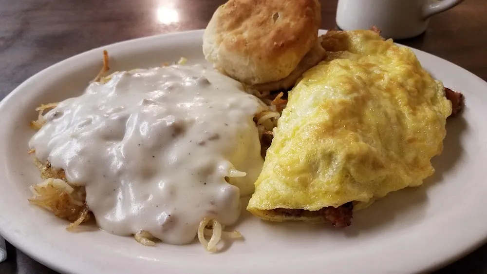 Sausage & Cheese Omelet Hash Browns with Sausage Gravy and Biscuit